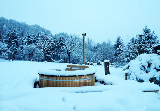 XXL wooden hot tub interior showing internal wood-fired furnace