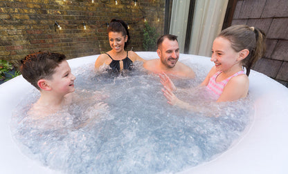 Lay-Z-Spa Miami hot tub with people relaxing