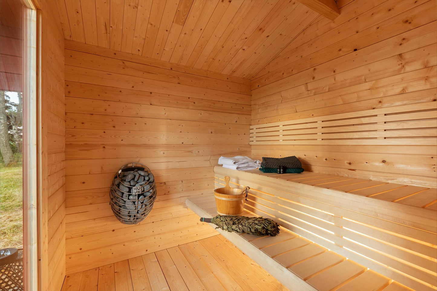 Sauna Vinja garden setting