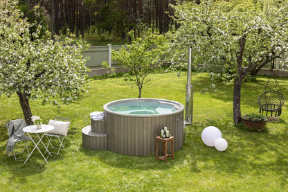Polar Spa hot tub with integrated wood-fired stove