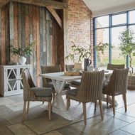Amalfi Collection outdoor dining chair in garden setting
