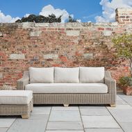Capri Collection outdoor sofa in garden setting