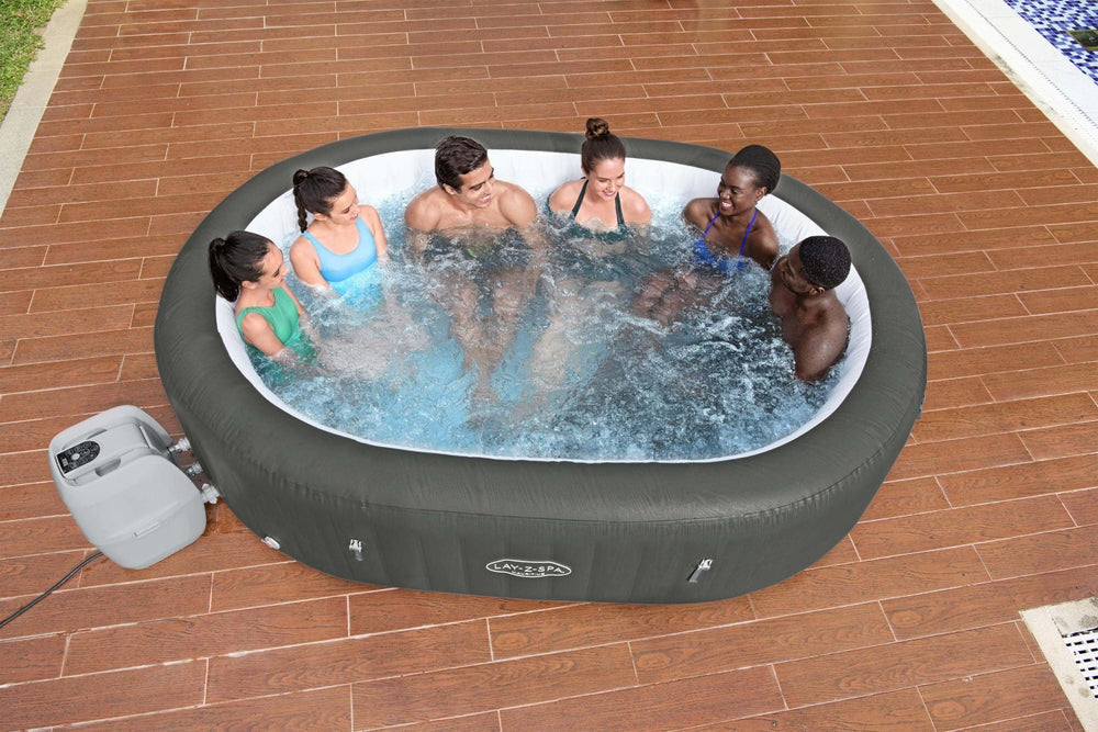 Ryny Mauritius AirJet 7-person inflatable hot tub with people relaxing
