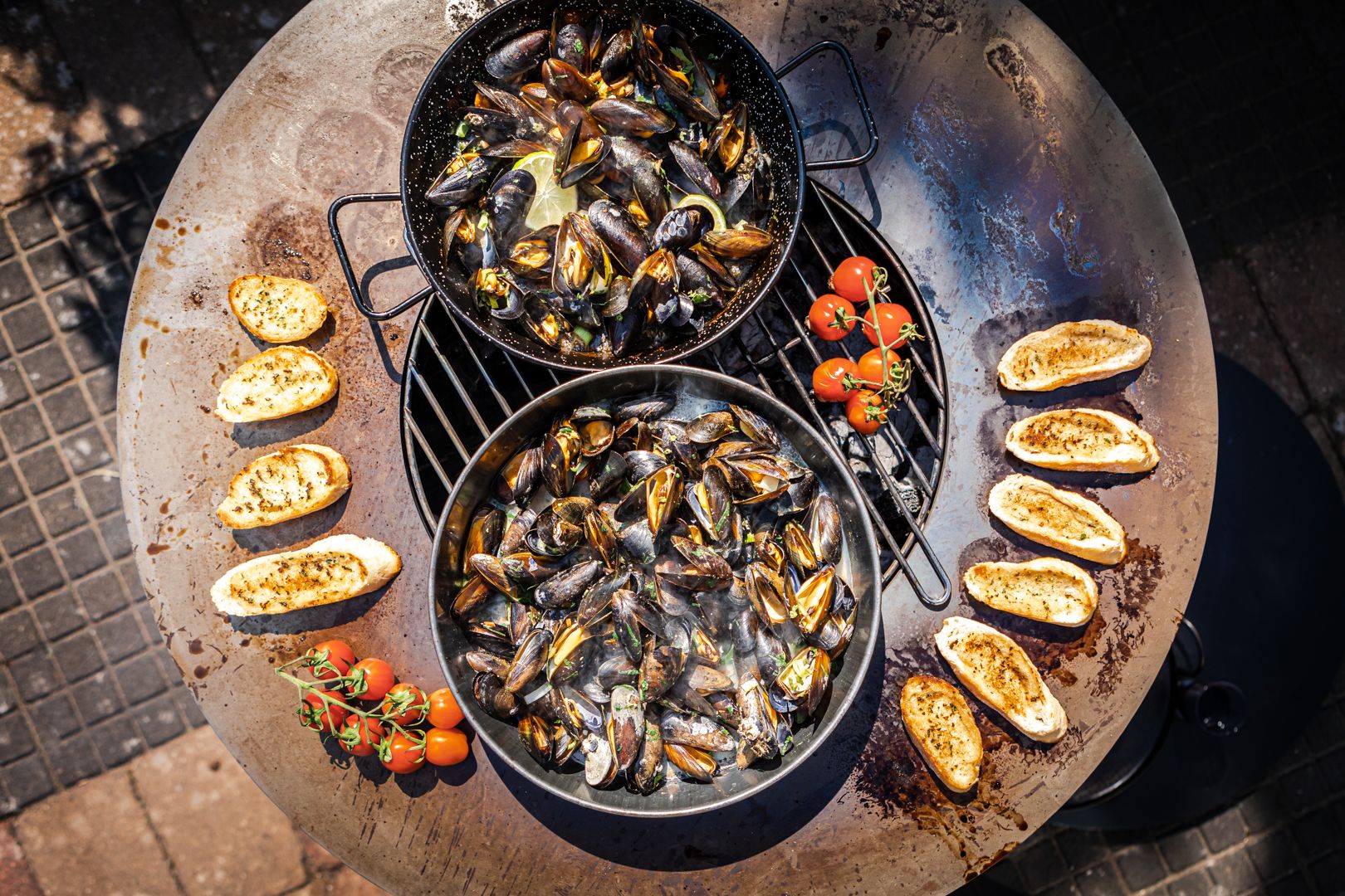 BonFeu BonBiza Open plancha grill in garden setting
