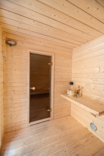 Oval Sauna Pod garden lifestyle setting