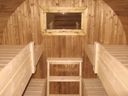 Barrel guest cabin sleeping area with 4 beds for 4 guests