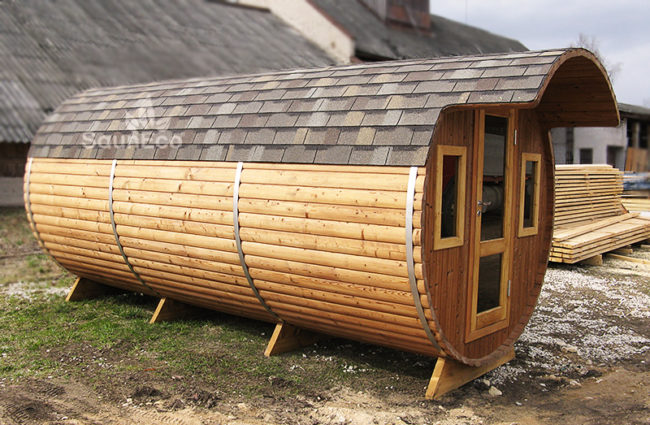 Three room barrel sauna restroom section