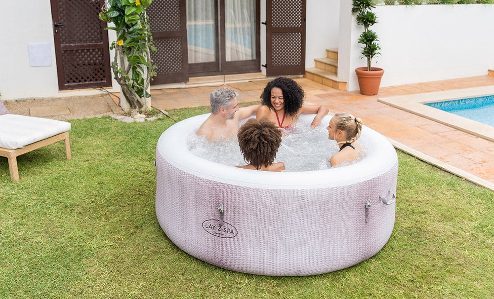 Ryny Cancun AirJet hot tub with friends outdoors