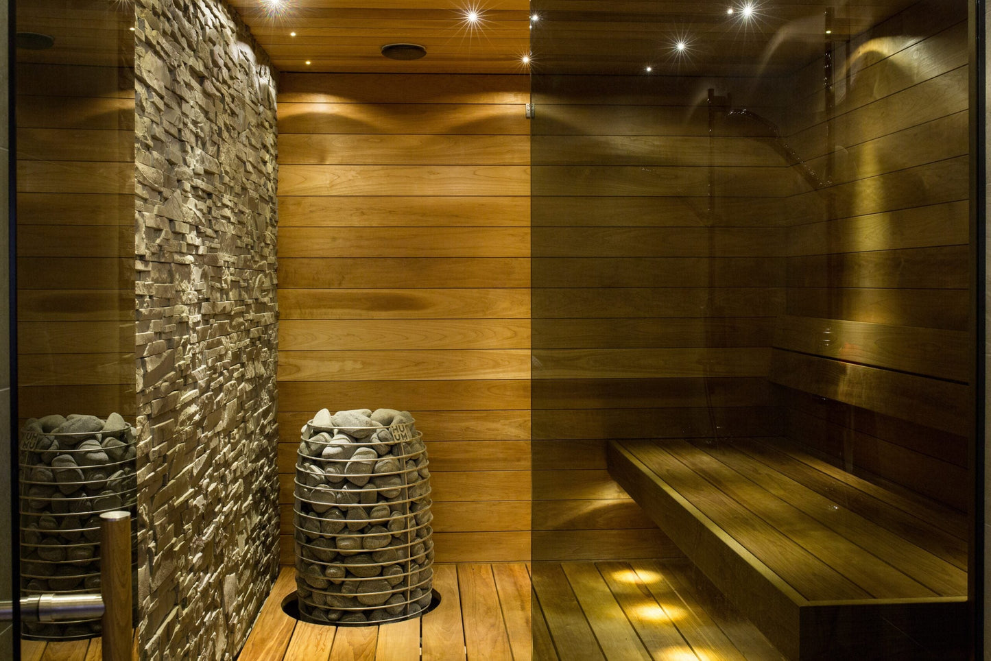 Barrel Saunas Huum Hive 18kW electric sauna furnace close-up glowing stones