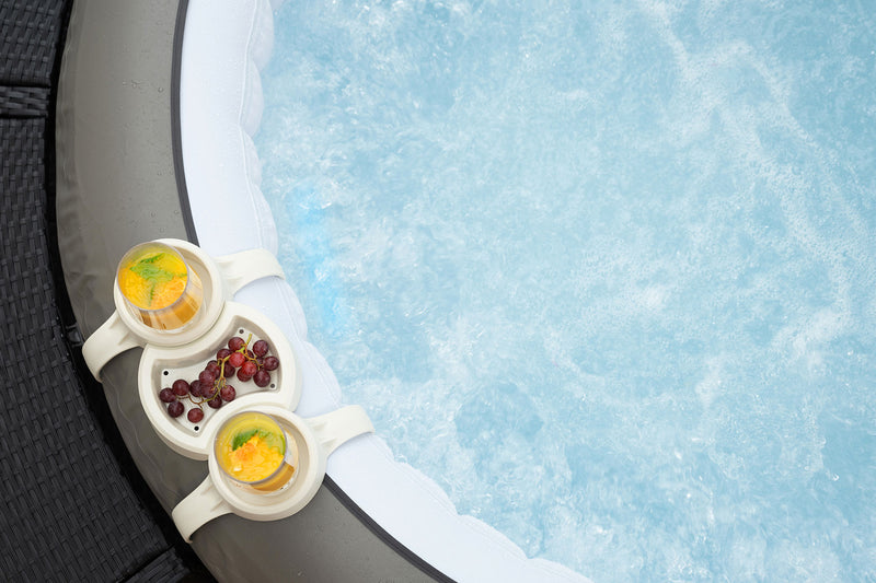 Inflatable hot tub drinks holder in use