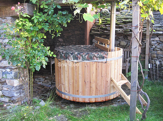 Barrel Saunas 3-person Mini Larch Hot Tub in garden setting