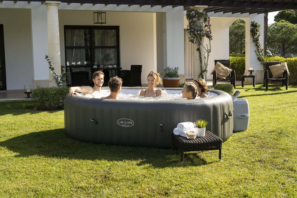 Ryny Mauritius AirJet large inflatable hot tub in backyard setting