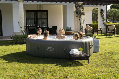 Ryny Mauritius AirJet large inflatable hot tub in backyard setting