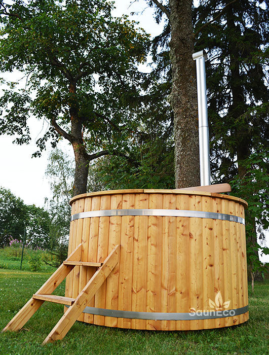 Barrel Saunas 4-person Family Larch Hot Tub in garden setting