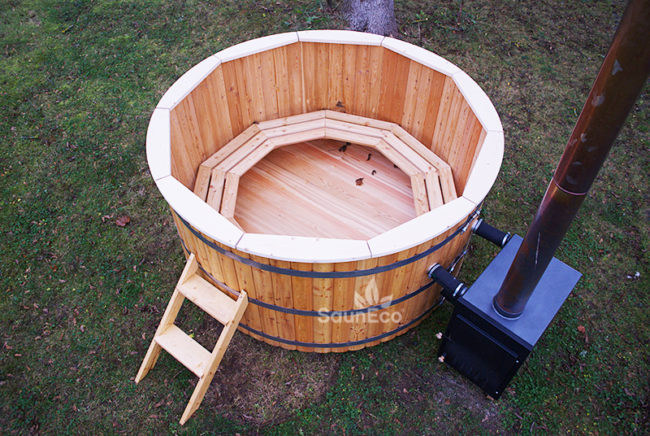Large wooden hot tub side view showing larch wood construction
