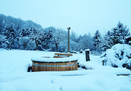 XXL wooden hot tub interior showing internal wood-fired furnace
