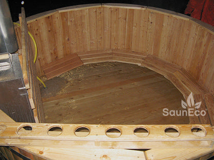 XXL round wooden hot tub installed outdoors