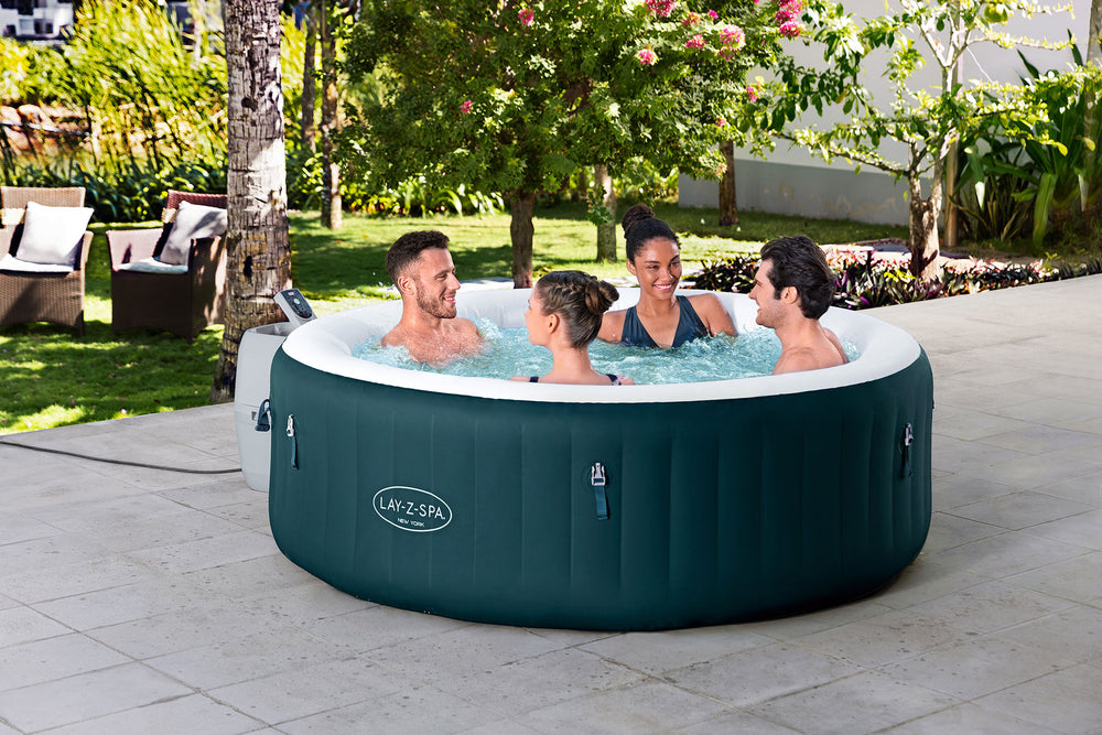 Ryny New York AirJet hot tub with people relaxing outdoors