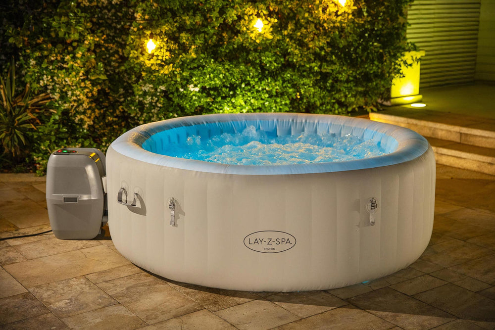 Lay-Z-Spa Paris hot tub illuminated at night