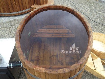 Couple soaking in Barrel Saunas Mini Thermowood Hot Tub Spa outdoors