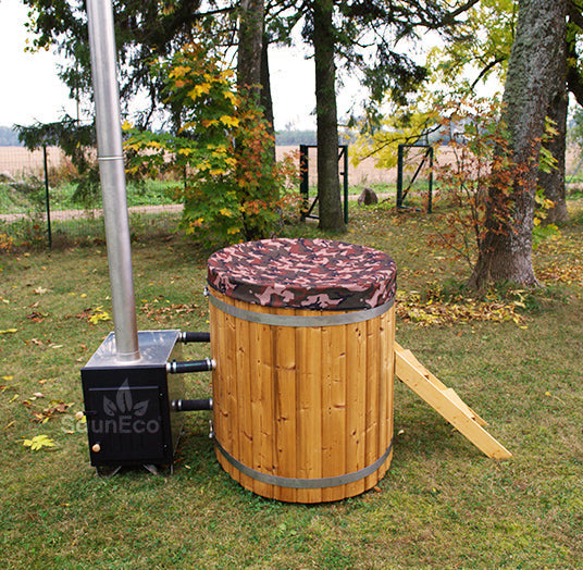 Tarpaulin cover fitted over a wooden hot tub barrel