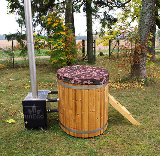 Tarpaulin cover fitted over a wooden hot tub barrel