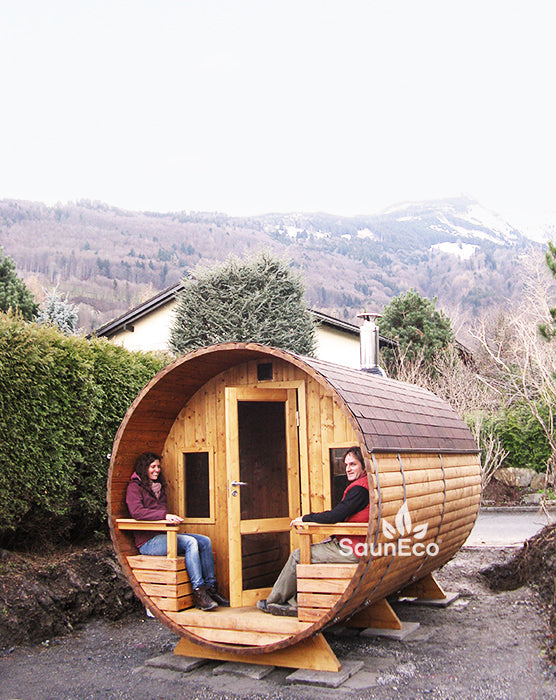 Barrel Saunas two-room sauna lodge side view showing thermowood construction