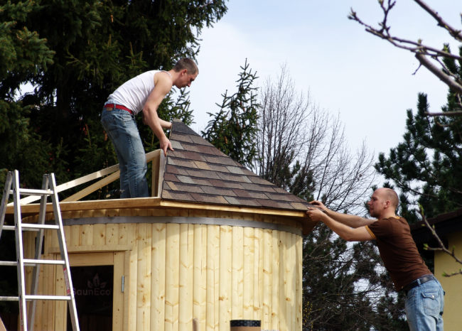 Upright garden sauna lodge side view showing thermowood construction